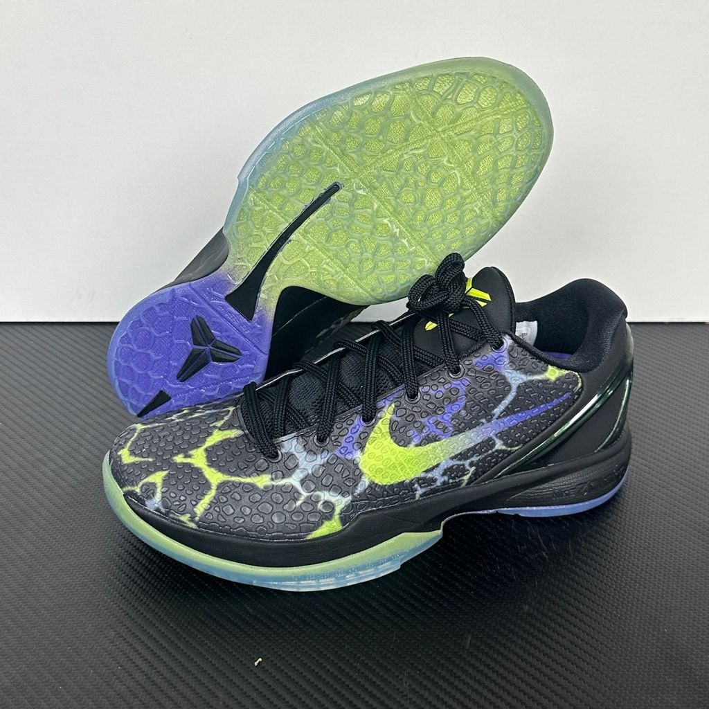 Side profile of the Nike Kobe 6 Protro "Coals" basketball shoe, featuring a stealthy black textured reptilian scale upper, vibrant Venom Green Swoosh and laces, contrasting Purple Venom accents, and a responsive Zoom Air midsole.