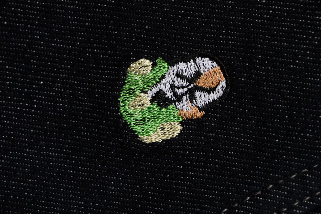 Mini character embroidered denim trousers