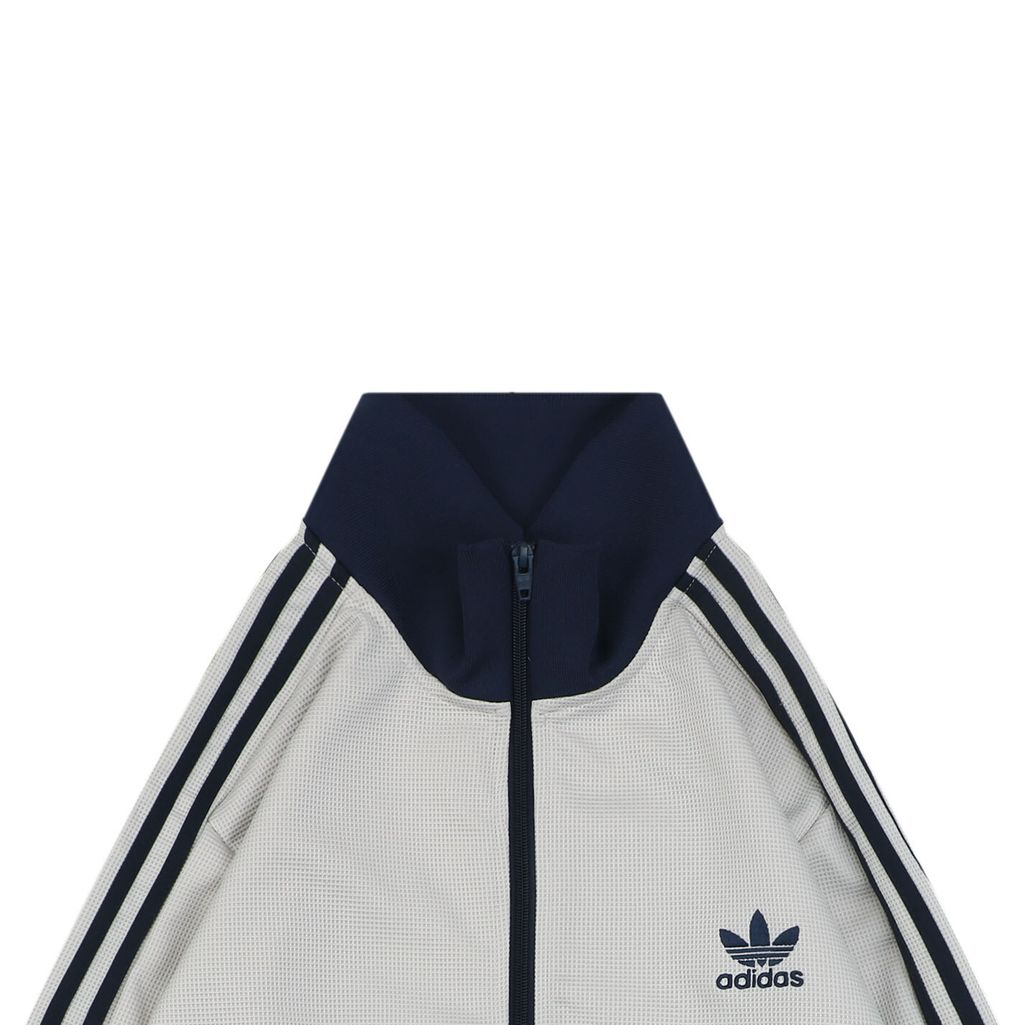 Trefoil embroidered high collar jacket