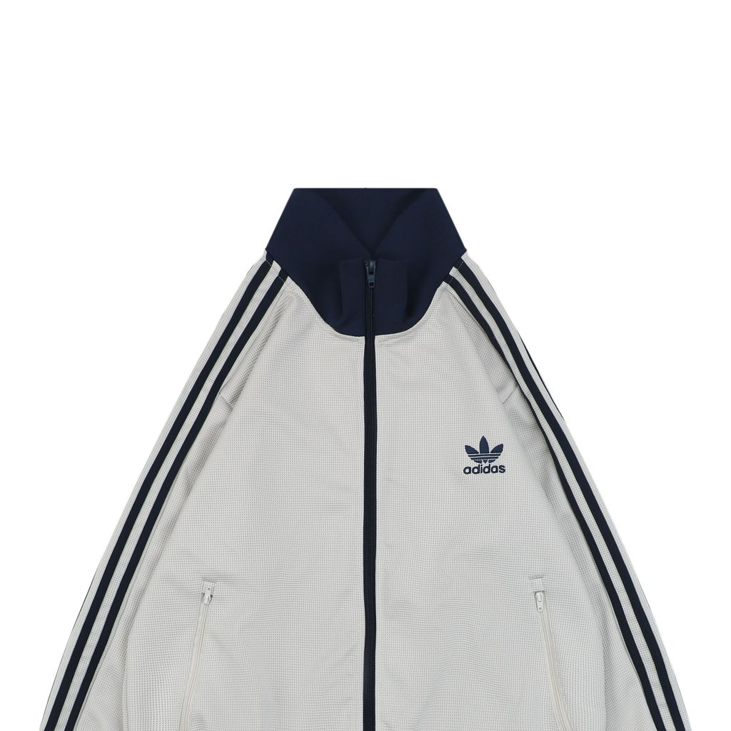 Trefoil embroidered high collar jacket