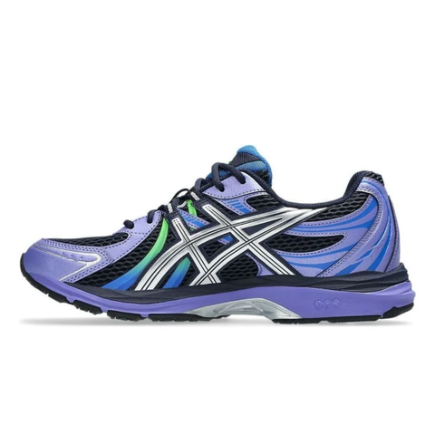 Side profile of the ASICS Gel-Sekiran sneaker featuring a breathable midnight navy mesh upper, dynamic metallic pure silver synthetic overlays, and a sculpted midsole equipped with visible GEL technology cushioning.