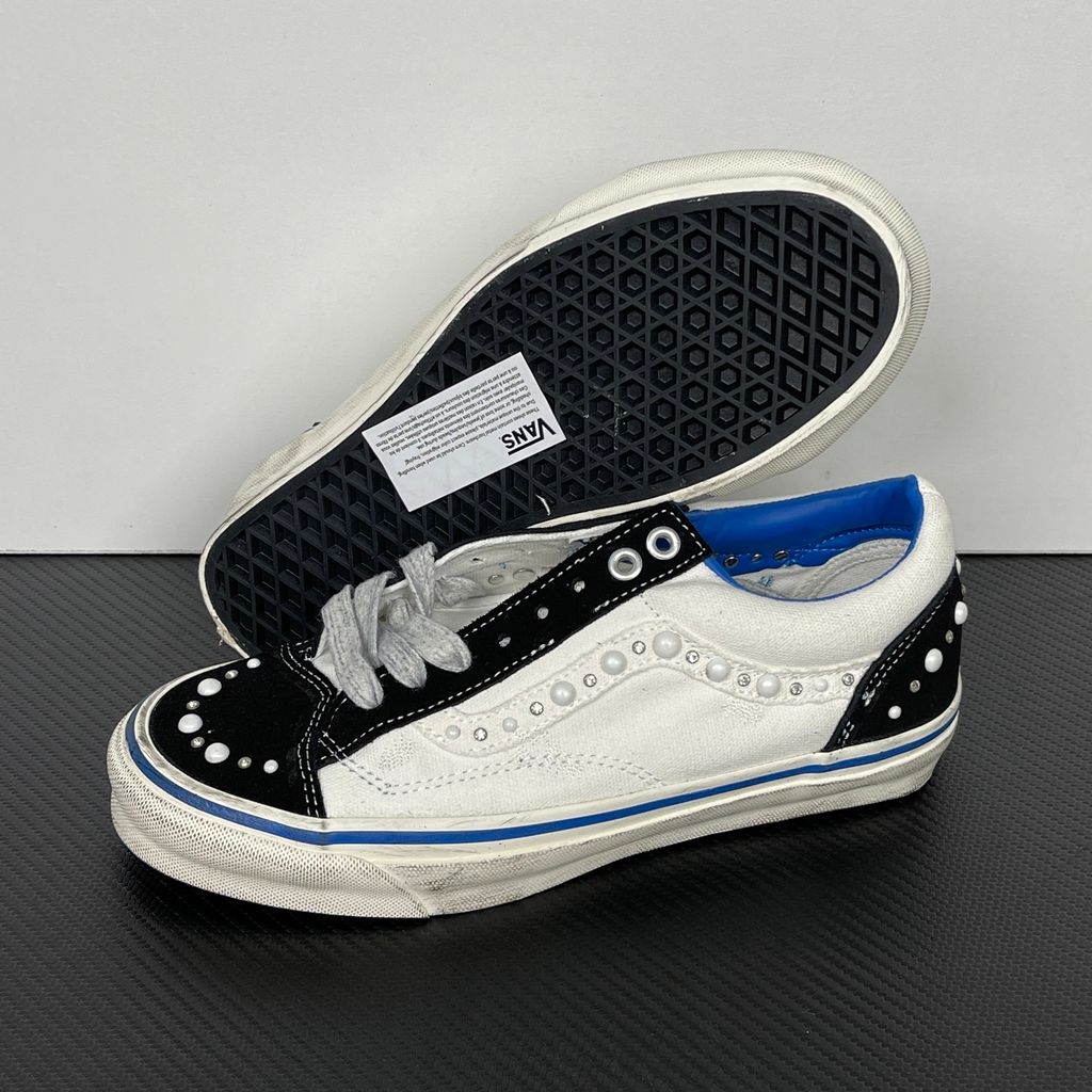 Side profile of Vans OTW Old Skool Reissue 36 Pearlized Marshmallow VN000S52FS8 with cream canvas, black suede panels, pearl and crystal studs and a blue foxing stripe.