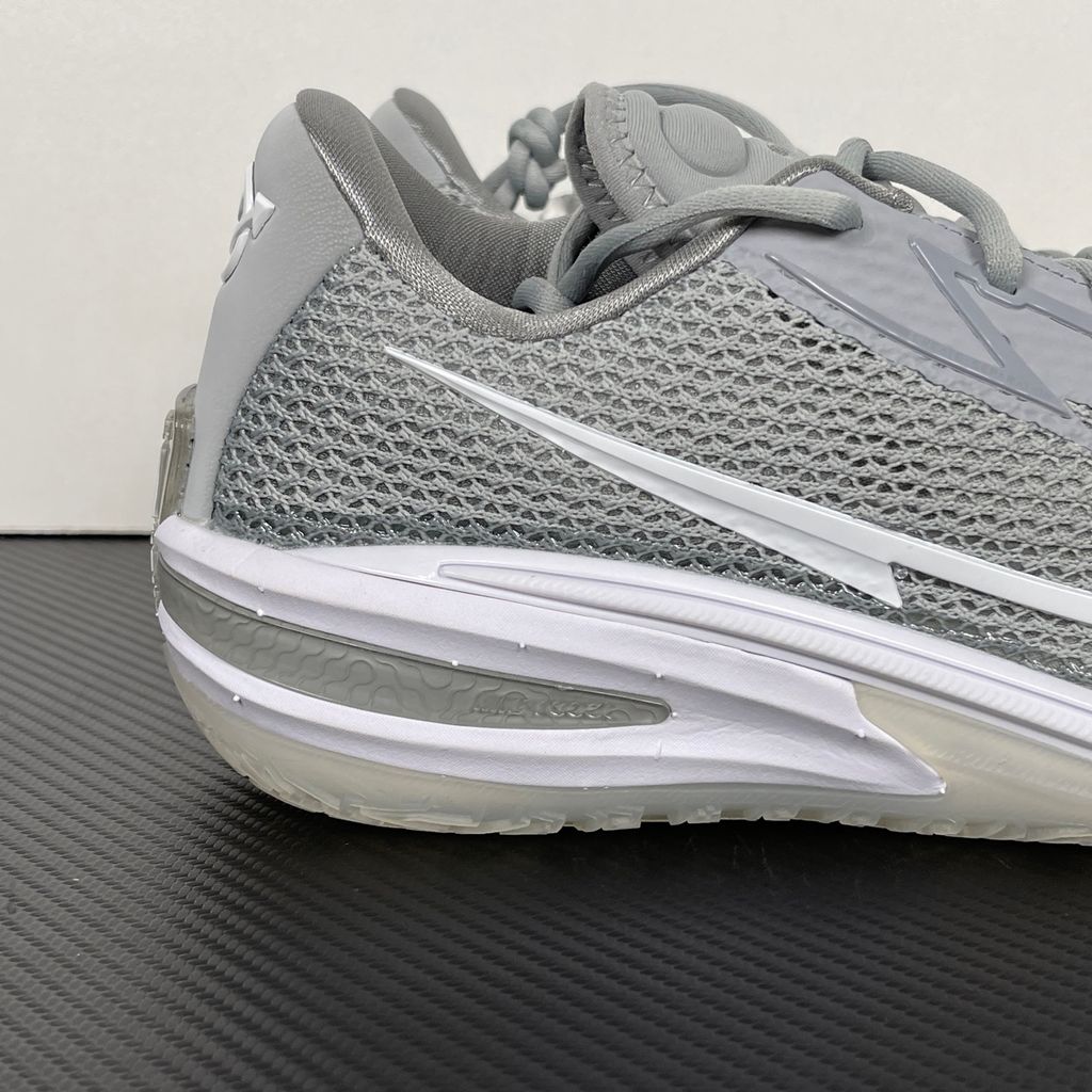 Side profile of Nike Air Zoom G.T. Cut 1 TB Wolf Grey DM5039-003 performance basketball shoe with grey mesh and black Swoosh branding.