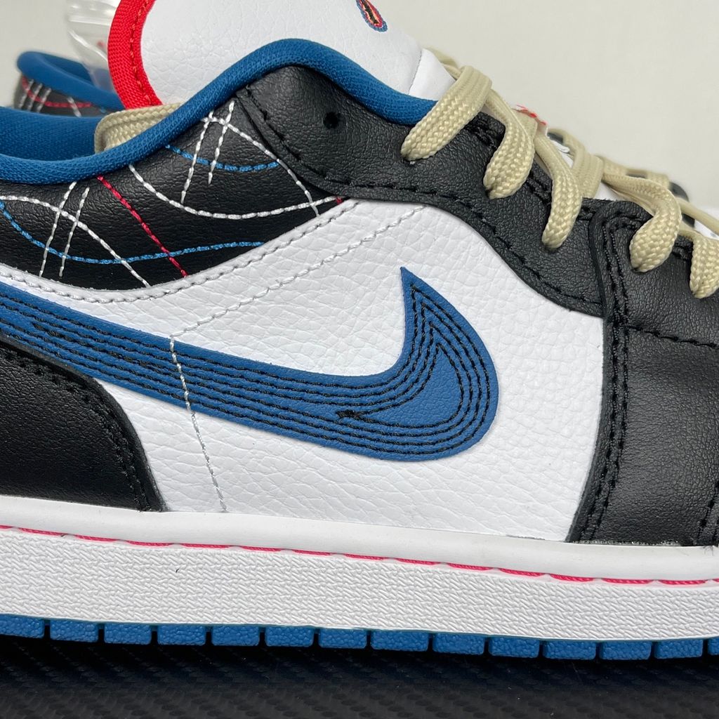 Side profile of Air Jordan 1 Low SE Industrial Blue Sashiko FV3622-141 with white leather, blue details and decorative stitching.  Image