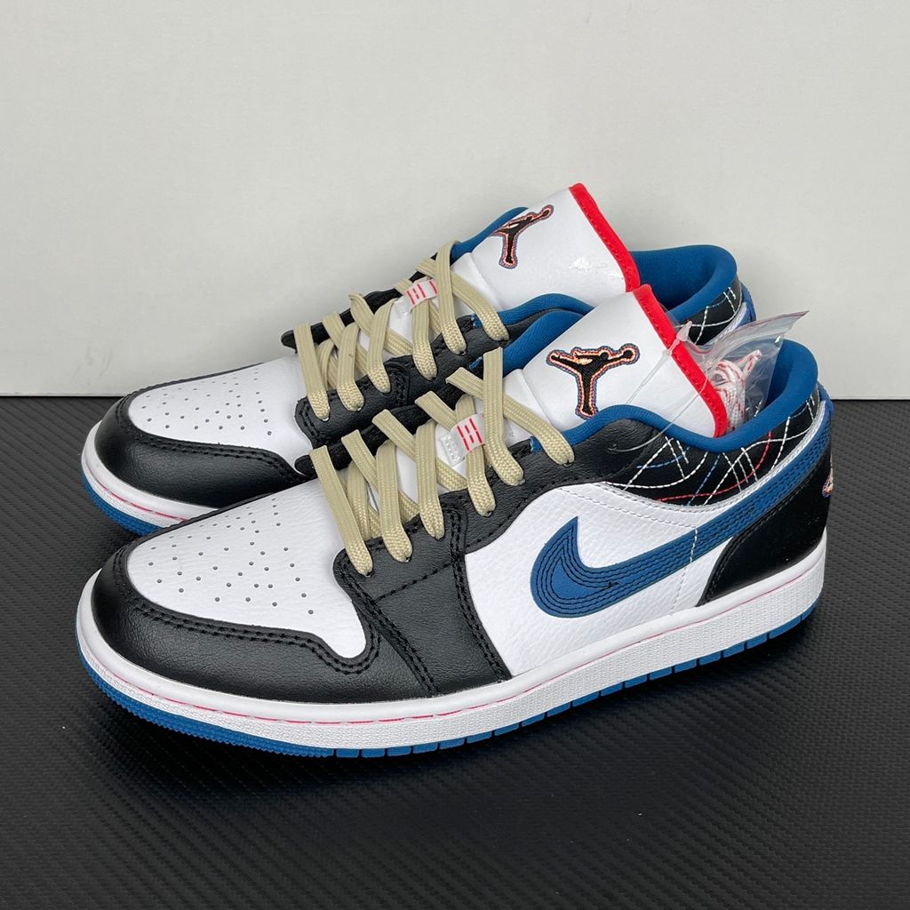 Side profile of Air Jordan 1 Low SE Industrial Blue Sashiko FV3622-141 with white leather, blue details and decorative stitching.  Image