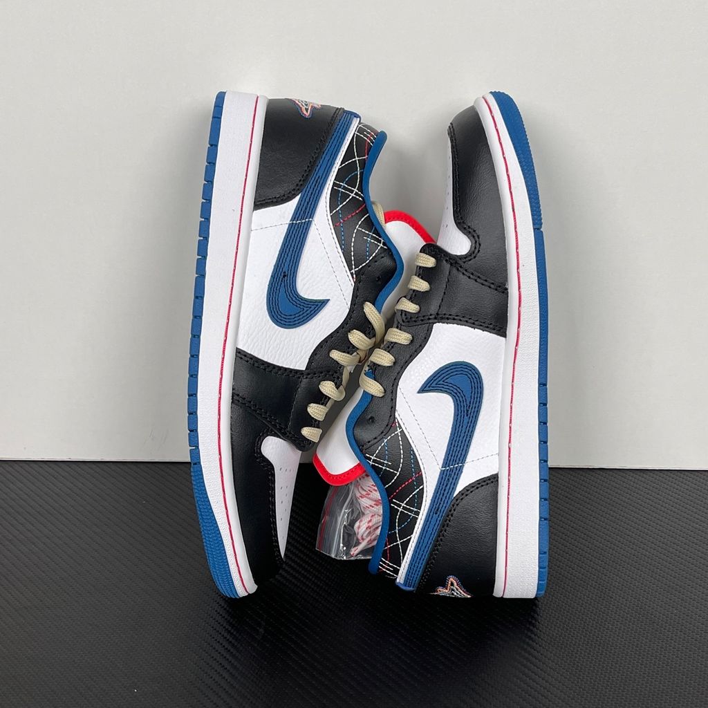 Side profile of Air Jordan 1 Low SE Industrial Blue Sashiko FV3622-141 with white leather, blue details and decorative stitching.  Image