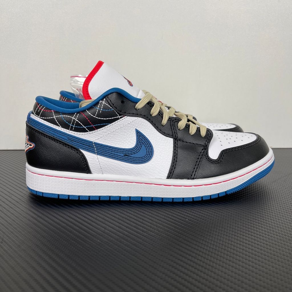 Side profile of Air Jordan 1 Low SE Industrial Blue Sashiko FV3622-141 with white leather, blue details and decorative stitching.  Image