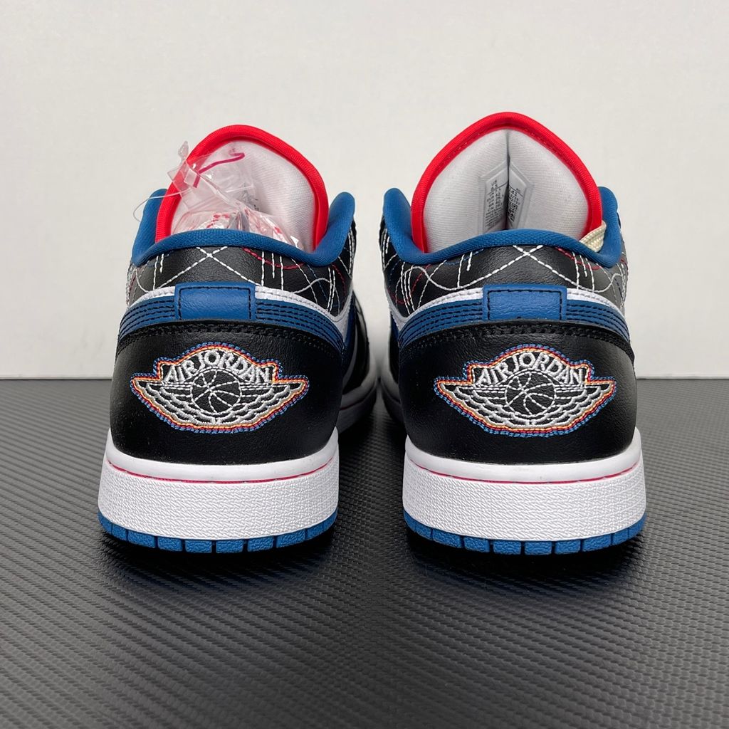 Side profile of Air Jordan 1 Low SE Industrial Blue Sashiko FV3622-141 with white leather, blue details and decorative stitching.  Image