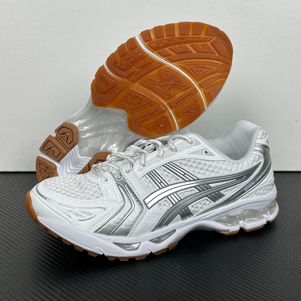 ASICS Gel-Kayano 14 A.P.C. White Pure Silver 1203A727-100 unisex sneaker with white mesh, metallic silver overlays and GEL cushioning, side view.