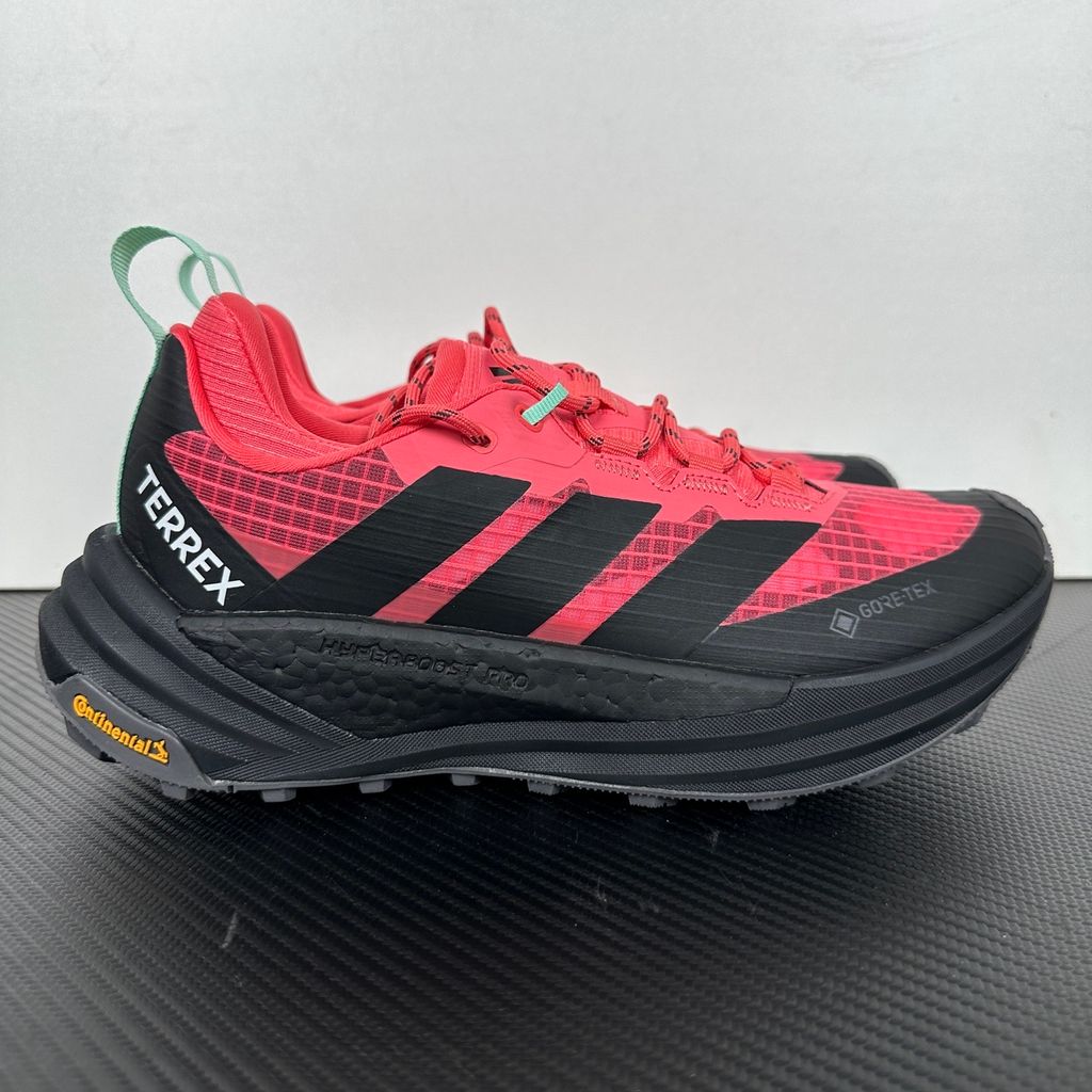 adidas TERREX Freehiker 3 Low GORE-TEX Pure Turbo KI8282 women’s hiking shoe with black accents, waterproof ripstop upper and rugged trail outsole, side view.