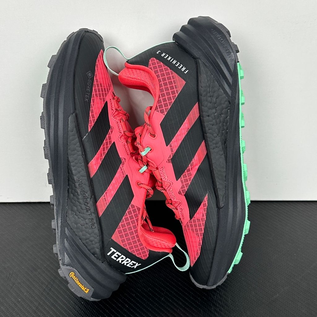 adidas TERREX Freehiker 3 Low GORE-TEX Pure Turbo KI8282 women’s hiking shoe with black accents, waterproof ripstop upper and rugged trail outsole, side view.