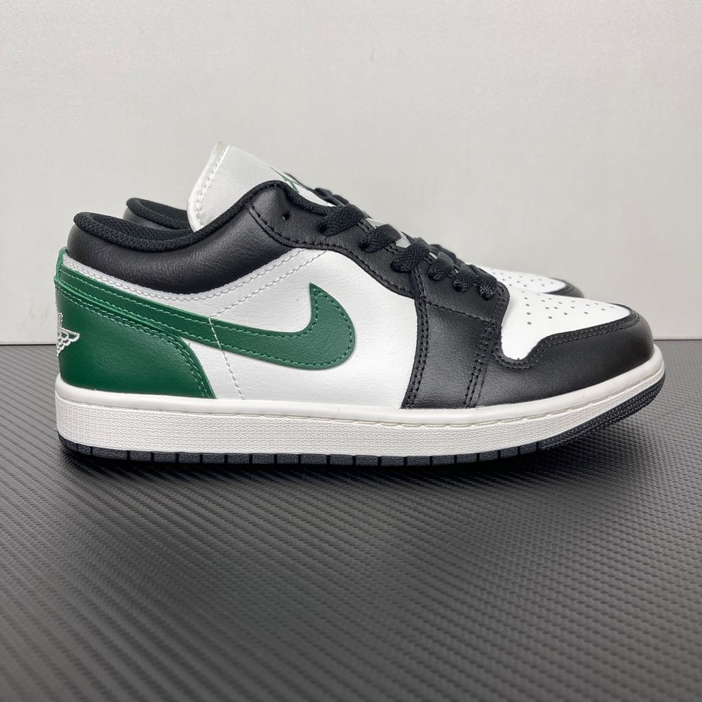 Air Jordan 1 Low Black Gorge Green 553558-047 men’s sneaker with a black leather upper, green accents, Summit White midsole and rubber outsole, side view.