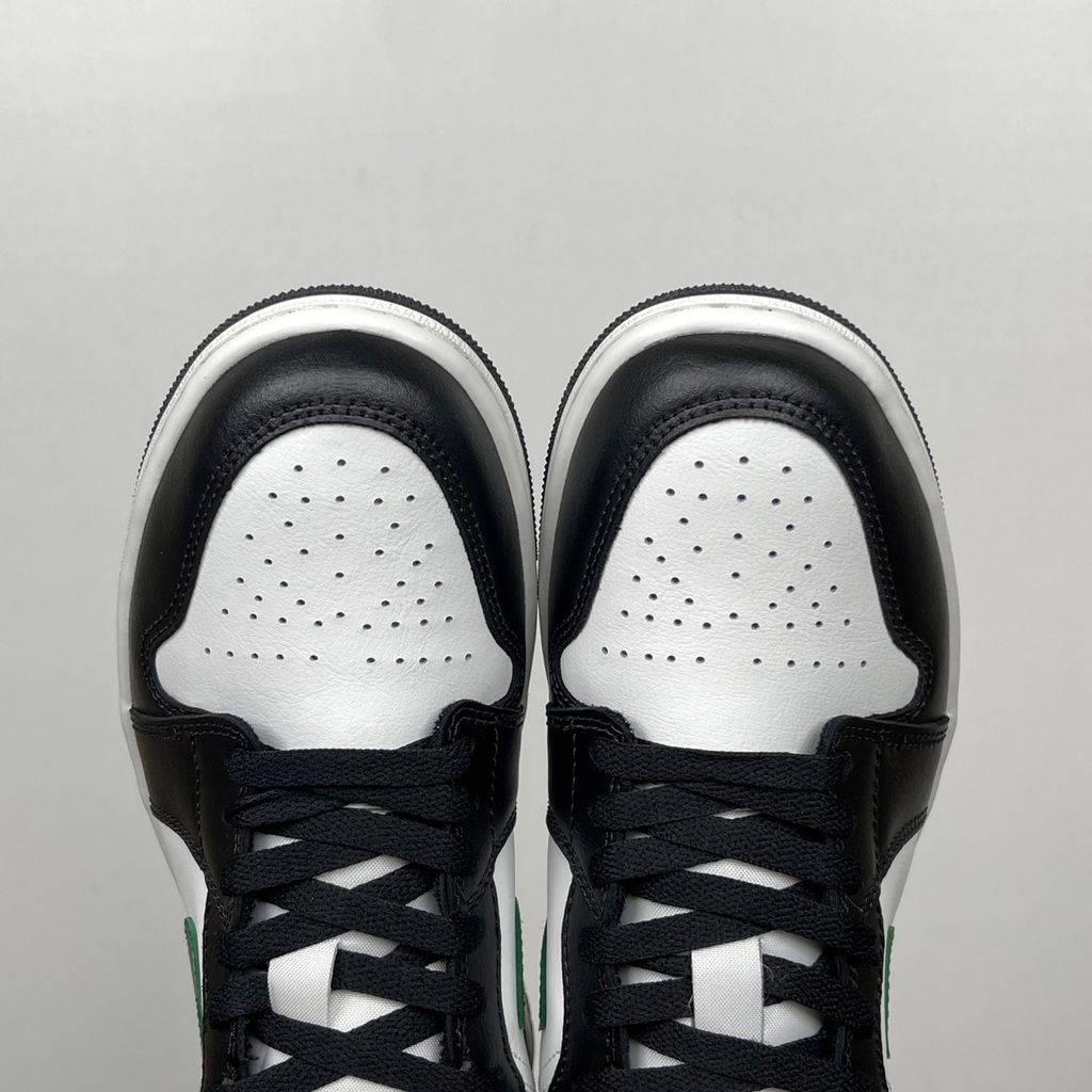 Air Jordan 1 Low Black Gorge Green 553558-047 men’s sneaker with a black leather upper, green accents, Summit White midsole and rubber outsole, side view.