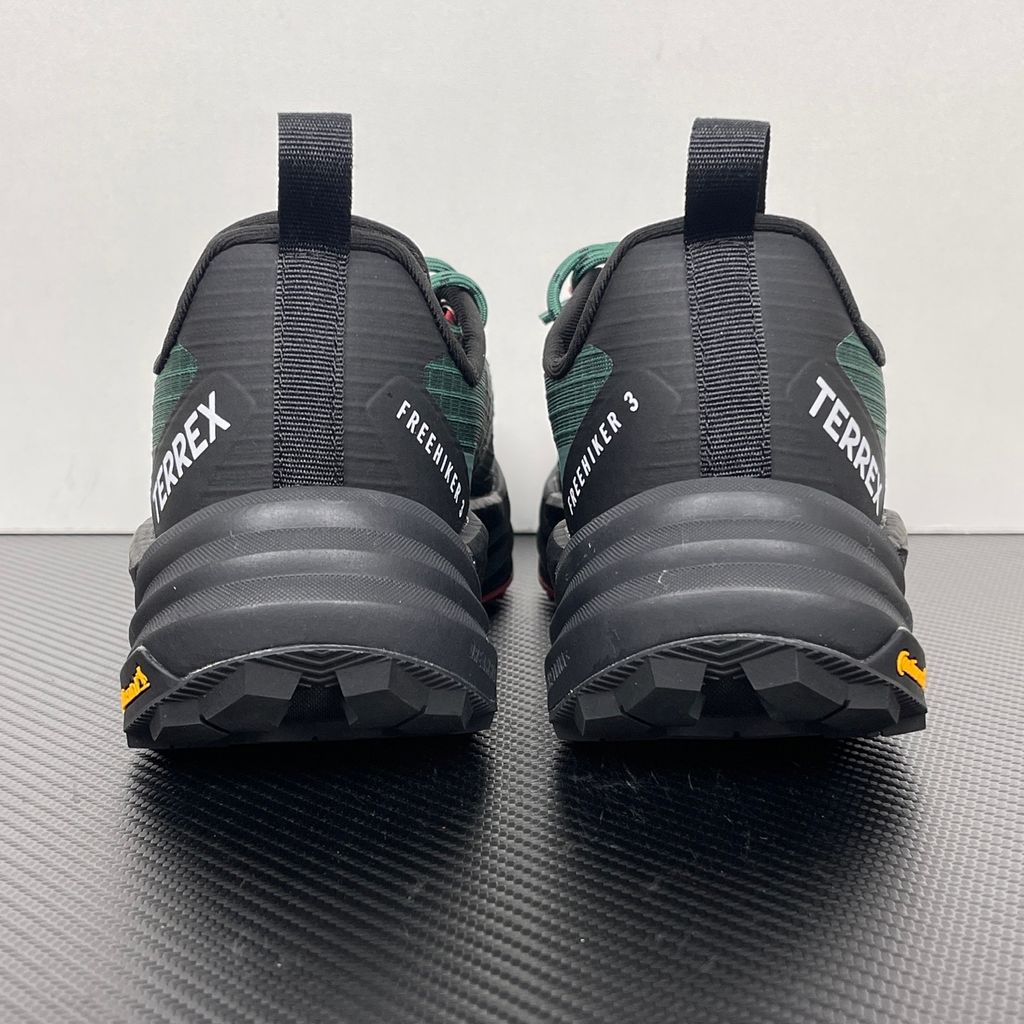 adidas TERREX Freehiker 3 Low GORE-TEX Collegiate Green KI8278 men’s hiking shoe with a green ripstop upper, black accents and Continental trail outsole, side view.
