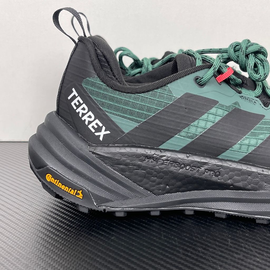 adidas TERREX Freehiker 3 Low GORE-TEX Collegiate Green KI8278 men’s hiking shoe with a green ripstop upper, black accents and Continental trail outsole, side view.