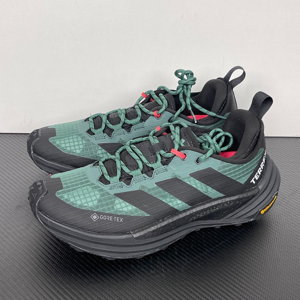 adidas TERREX Freehiker 3 Low GORE-TEX Collegiate Green KI8278 men’s hiking shoe with a green ripstop upper, black accents and Continental trail outsole, side view.