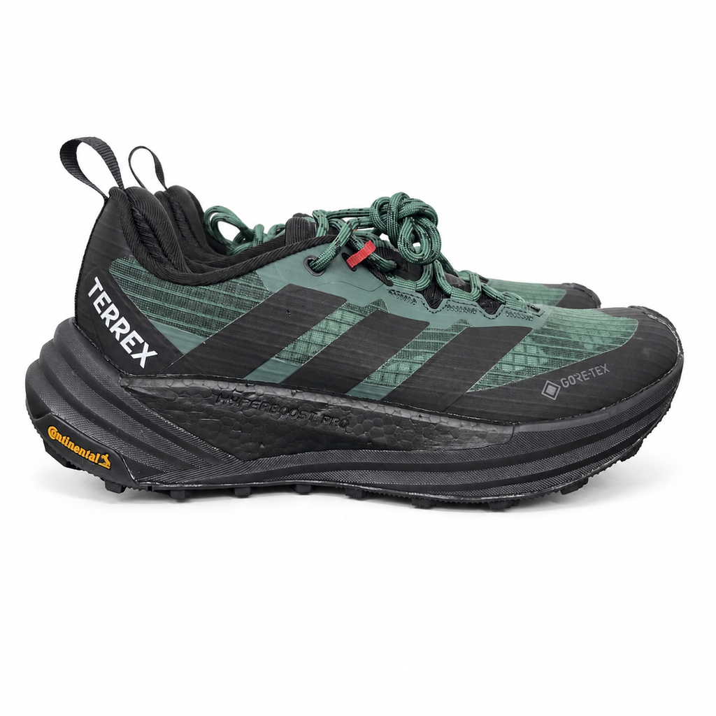 adidas TERREX Freehiker 3 Low GORE-TEX Collegiate Green KI8278 men’s hiking shoe with a green ripstop upper, black accents and Continental trail outsole, side view.