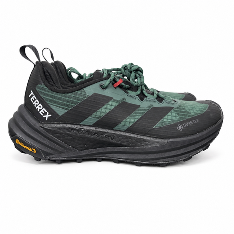 adidas TERREX Freehiker 3 Low GORE-TEX Collegiate Green KI8278 men’s hiking shoe with a green ripstop upper, black accents and Continental trail outsole, side view.