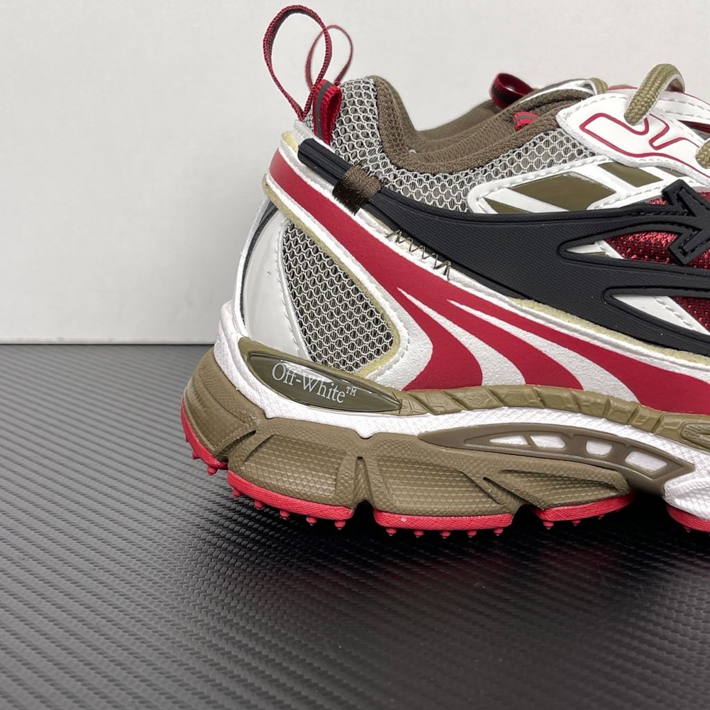 Off-White Be Right Back Khaki Red OMIA295S26FAB0022710 men’s sneaker with grey mesh, red and khaki overlays, black Arrow motifs and red zip tie, side view.