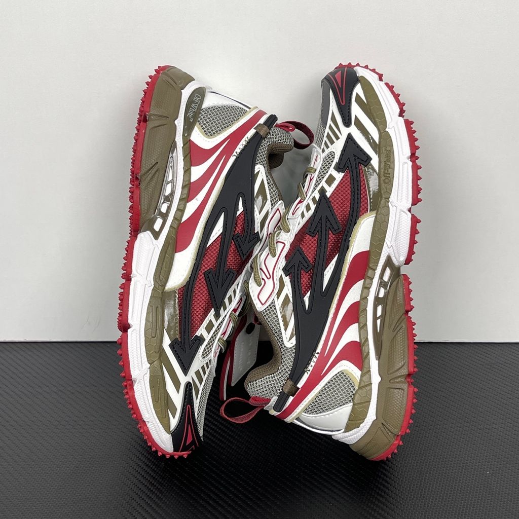 Off-White Be Right Back Khaki Red OMIA295S26FAB0022710 men’s sneaker with grey mesh, red and khaki overlays, black Arrow motifs and red zip tie, side view.