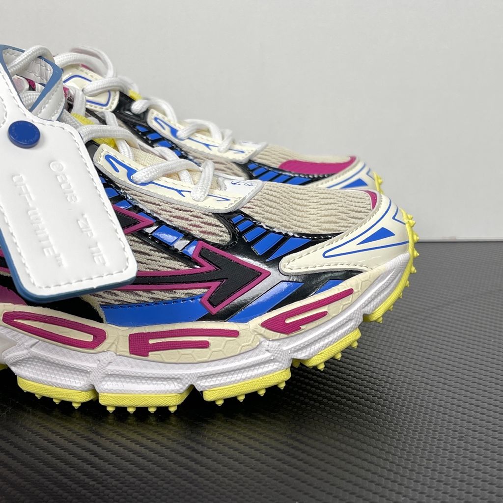 Off-White Be Right Back Magenta Royal Blue OWIA289S26FAB006-3969 women’s sneaker with ivory textile panels, black Arrow motifs and yellow rubber outsole, side view.