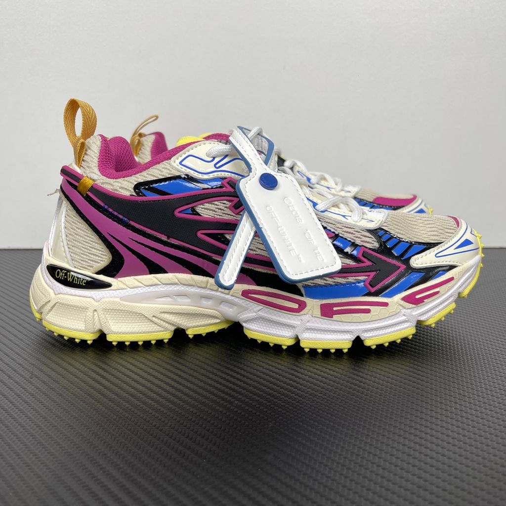 Off-White Be Right Back Magenta Royal Blue OWIA289S26FAB006-3969 women’s sneaker with ivory textile panels, black Arrow motifs and yellow rubber outsole, side view.