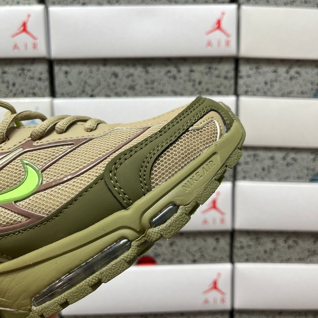 Supreme x Nike Shox Ride 2 Neutral Olive DN1615-200 sneaker with olive mesh, leather and nubuck panels, Electric Green accents and Supreme-branded Shox heel pillars.