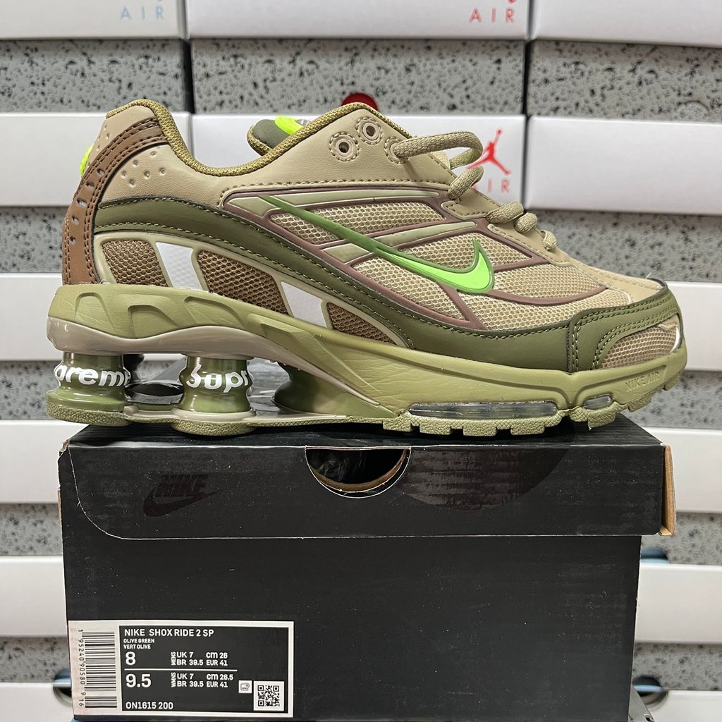 Supreme x Nike Shox Ride 2 Neutral Olive DN1615-200 sneaker with olive mesh, leather and nubuck panels, Electric Green accents and Supreme-branded Shox heel pillars.