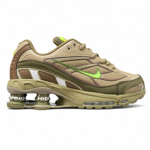 Supreme x Nike Shox Ride 2 Neutral Olive DN1615-200 sneaker with olive mesh, leather and nubuck panels, Electric Green accents and Supreme-branded Shox heel pillars.