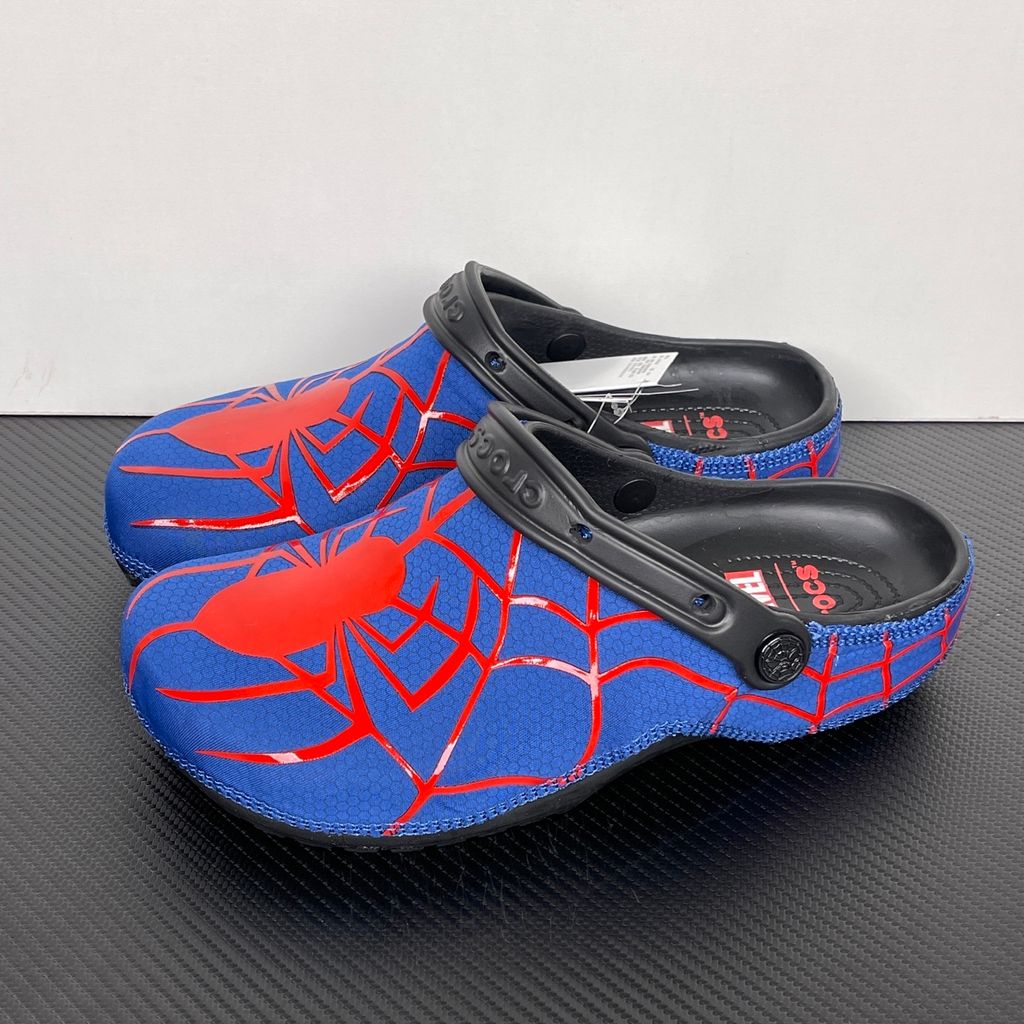 Crocs x Marvel Spider-Man Neo Classic Clog Multi 211489-90H with blue upper, red spider-web graphics, black pivoting heel strap and Spider-Man emblem.