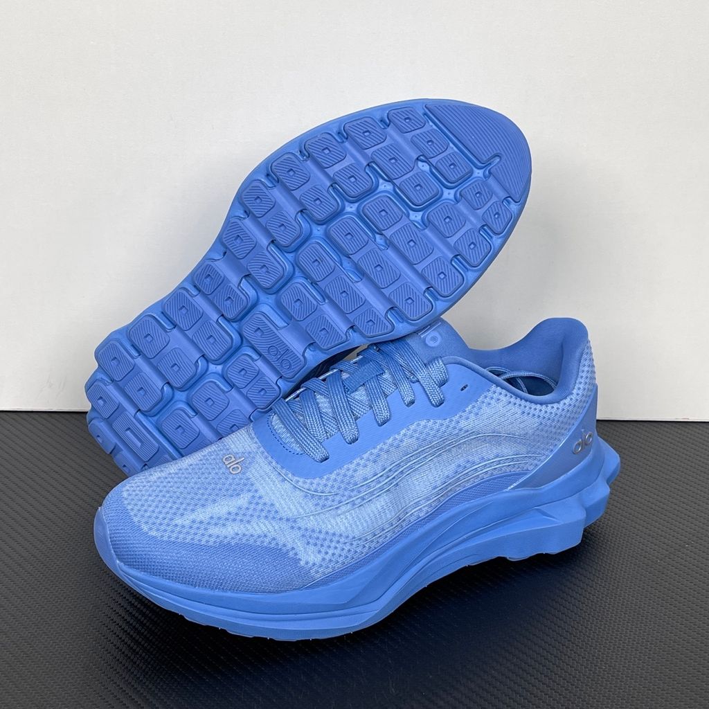 ALO Runner Crystal Clear Blue A0590U unisex sneaker with tonal blue double-layer mesh upper, stabilising heel clip and sculpted cushioned sole.