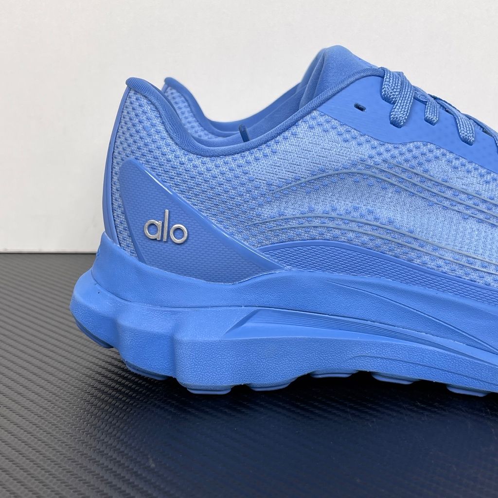 ALO Runner Crystal Clear Blue A0590U unisex sneaker with tonal blue double-layer mesh upper, stabilising heel clip and sculpted cushioned sole.