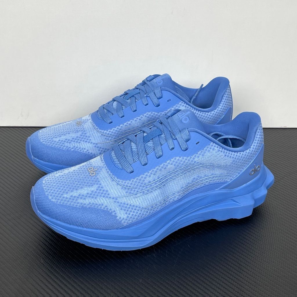 ALO Runner Crystal Clear Blue A0590U unisex sneaker with tonal blue double-layer mesh upper, stabilising heel clip and sculpted cushioned sole.