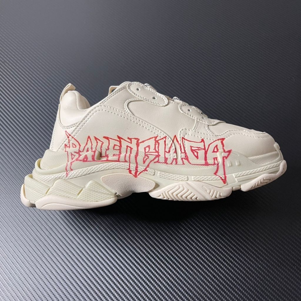 Balenciaga Triple S Graffiti Off-White 536737W2FAY9016 luxury chunky sneaker with red graffiti logo, side profile view.