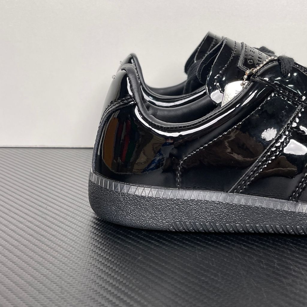Maison Margiela Replica Low S58WS0109 black patent leather sneakers side view