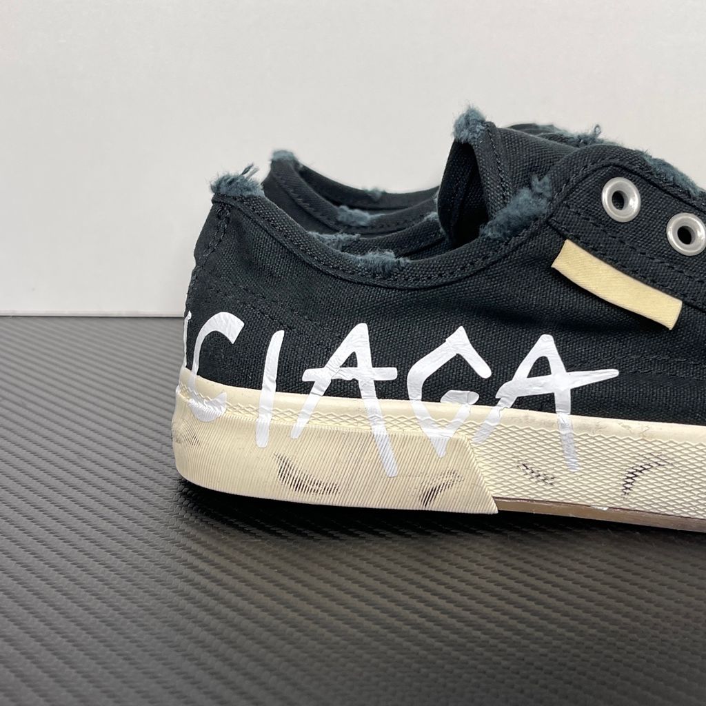 Balenciaga Paris Mid 688754 W3RR5 1099 Black White distressed canvas sneakers side view