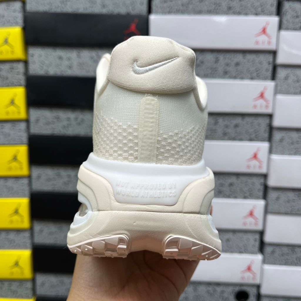 Nike Vomero Premium IQ8102-100 Chalk Pale Ivory women's running shoes side view