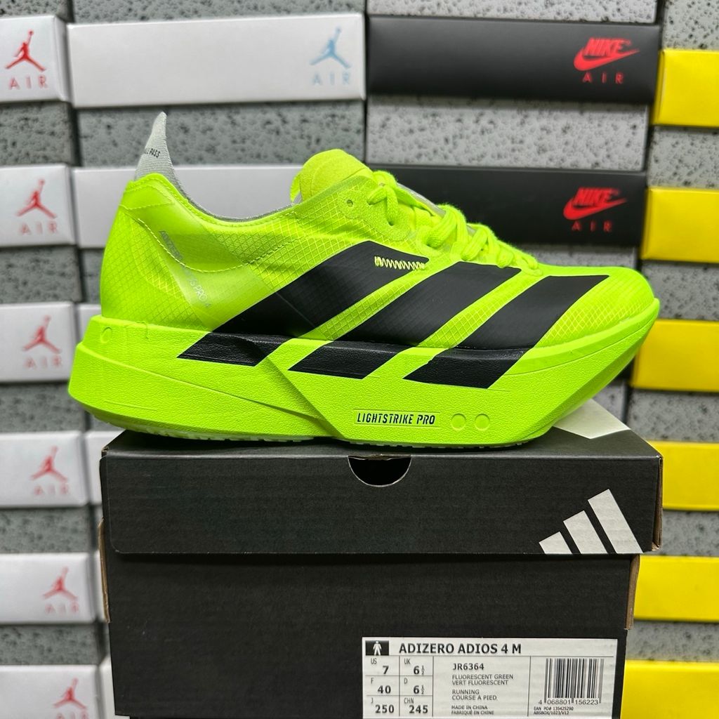 Shop adidas Adizero Adios Pro 4 JR6364 in Lucid Lemon, Core Black and Halo Silver with LIGHTSTRIKE PRO, ENERGYRODS 2.0 and Continental race traction.