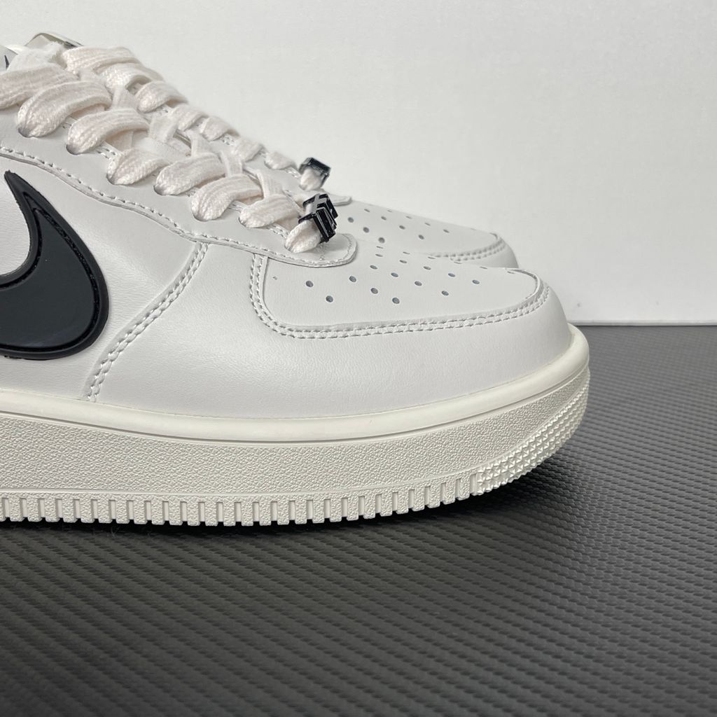 Shop Nike Air Force 1 Low SP x AMBUSH DV3464-002 Phantom with premium leather, oversized black Swoosh detailing and iconic AF1 streetwear styling.