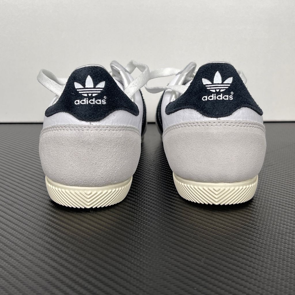 Shop adidas Japan IH5489 in Cloud White, Core Black and Gold Metallic with a leather upper, double-stitched T-toe and archival 1964 low-profile styling.