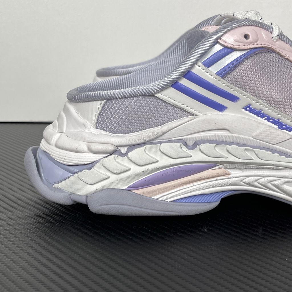 Shop Balenciaga Triple S.2 Mule 875020 WTSM0 5550 in Lilac Mix and Pink with gradient mesh styling, distressed detailing, hiking laces and a chunky 3-layer outsole.