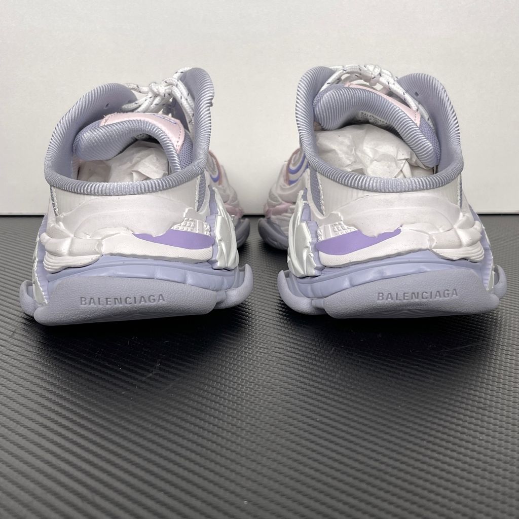 Shop Balenciaga Triple S.2 Mule 875020 WTSM0 5550 in Lilac Mix and Pink with gradient mesh styling, distressed detailing, hiking laces and a chunky 3-layer outsole.