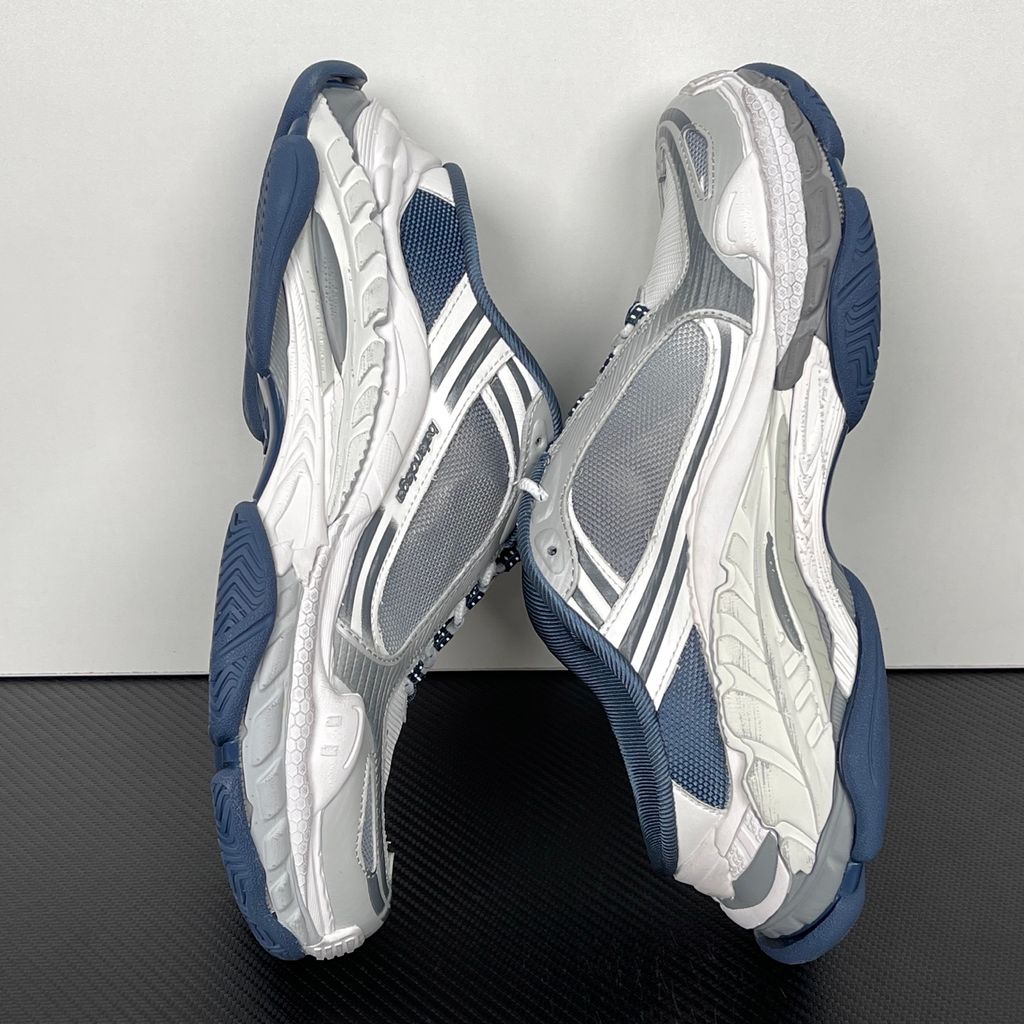 Shop Balenciaga Triple S.2 Mule 875021 WTSM0 4400 in Gradient Blue with layered technical construction, distressed detailing, hiking-style laces and a chunky 3-layer outsole.