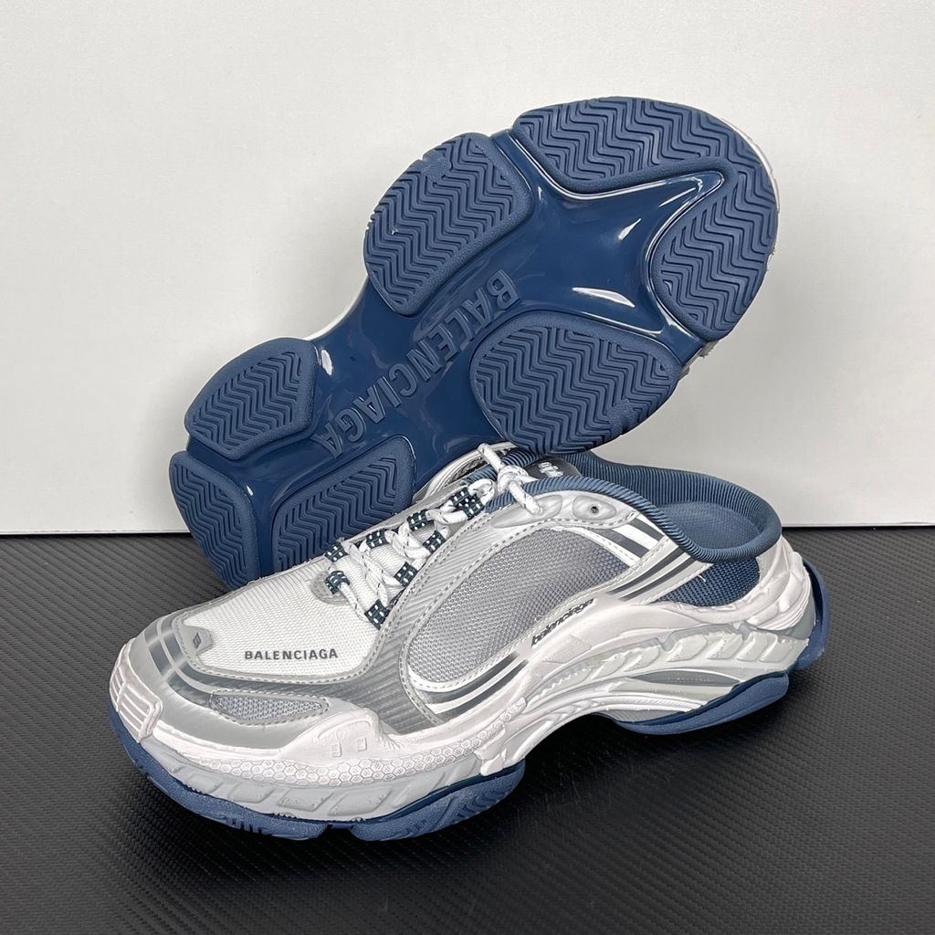 Shop Balenciaga Triple S.2 Mule 875021 WTSM0 4400 in Gradient Blue with layered technical construction, distressed detailing, hiking-style laces and a chunky 3-layer outsole.