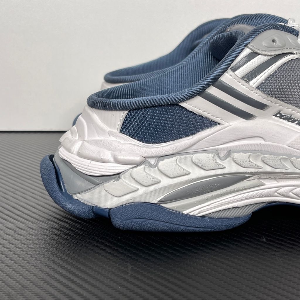 Shop Balenciaga Triple S.2 Mule 875021 WTSM0 4400 in Gradient Blue with layered technical construction, distressed detailing, hiking-style laces and a chunky 3-layer outsole.