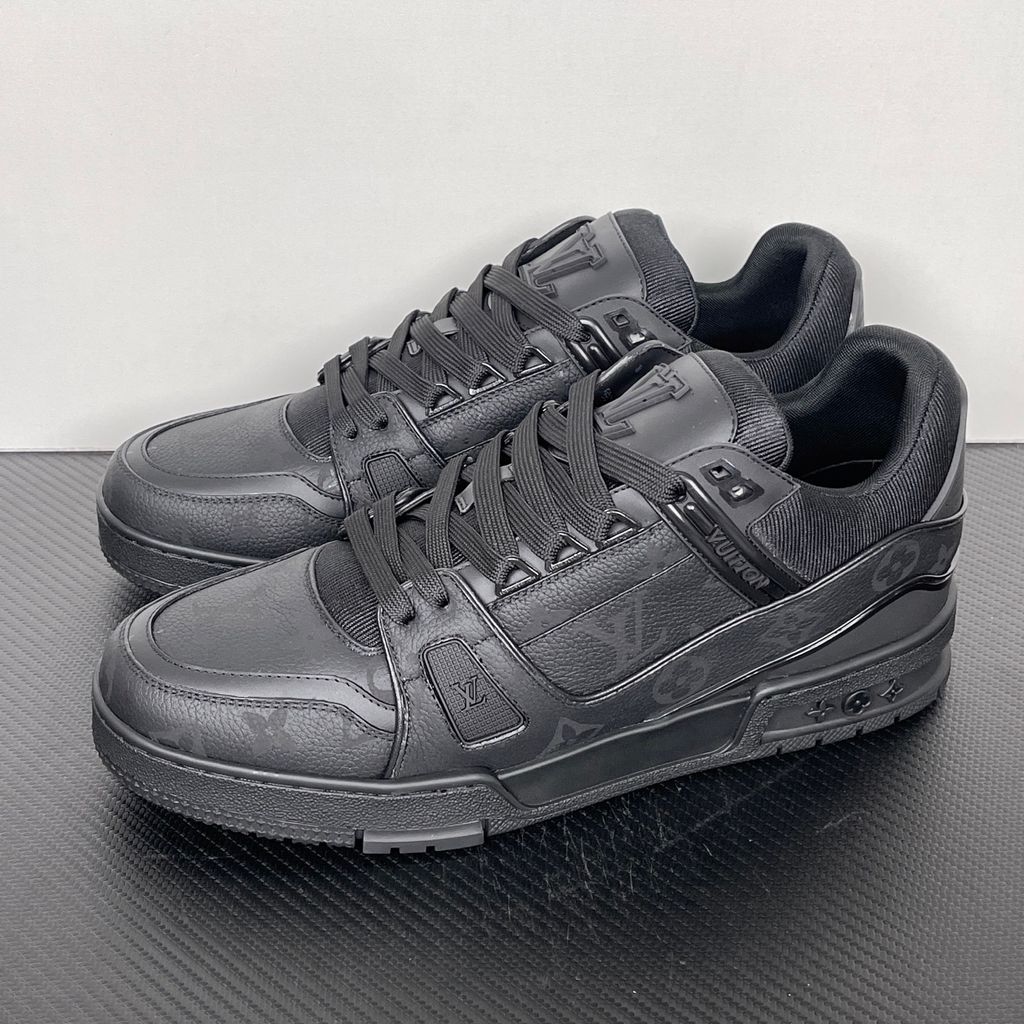 Shop Louis Vuitton LV Trainer Sneaker 1AHDBE in Noir Black with Monogram grained calf leather, rubber signatures, Monogram Flower outsole and Italian craftsmanship.