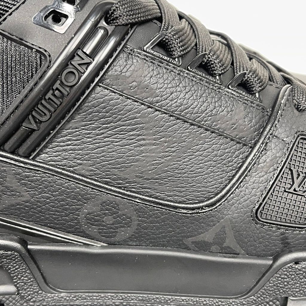 Shop Louis Vuitton LV Trainer Sneaker 1AHDBE in Noir Black with Monogram grained calf leather, rubber signatures, Monogram Flower outsole and Italian craftsmanship.