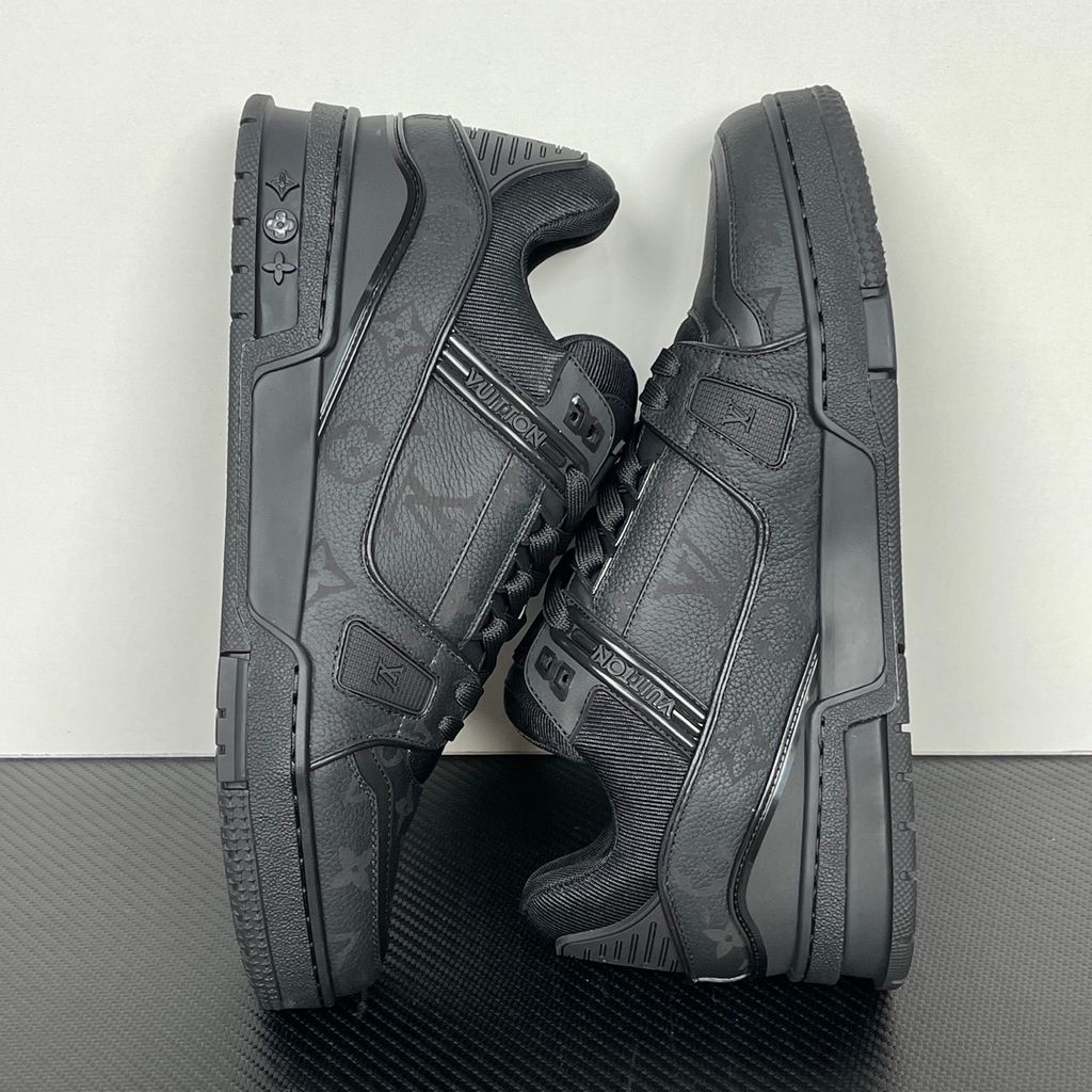 Shop Louis Vuitton LV Trainer Sneaker 1AHDBE in Noir Black with Monogram grained calf leather, rubber signatures, Monogram Flower outsole and Italian craftsmanship.