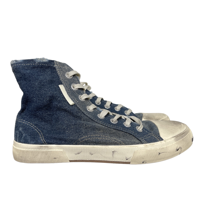 Shop Balenciaga Paris High Top 688752 W3RCL 4090 in Denim Blue with a destroyed denim upper, intentional vintage distressing and aged rubber sole.