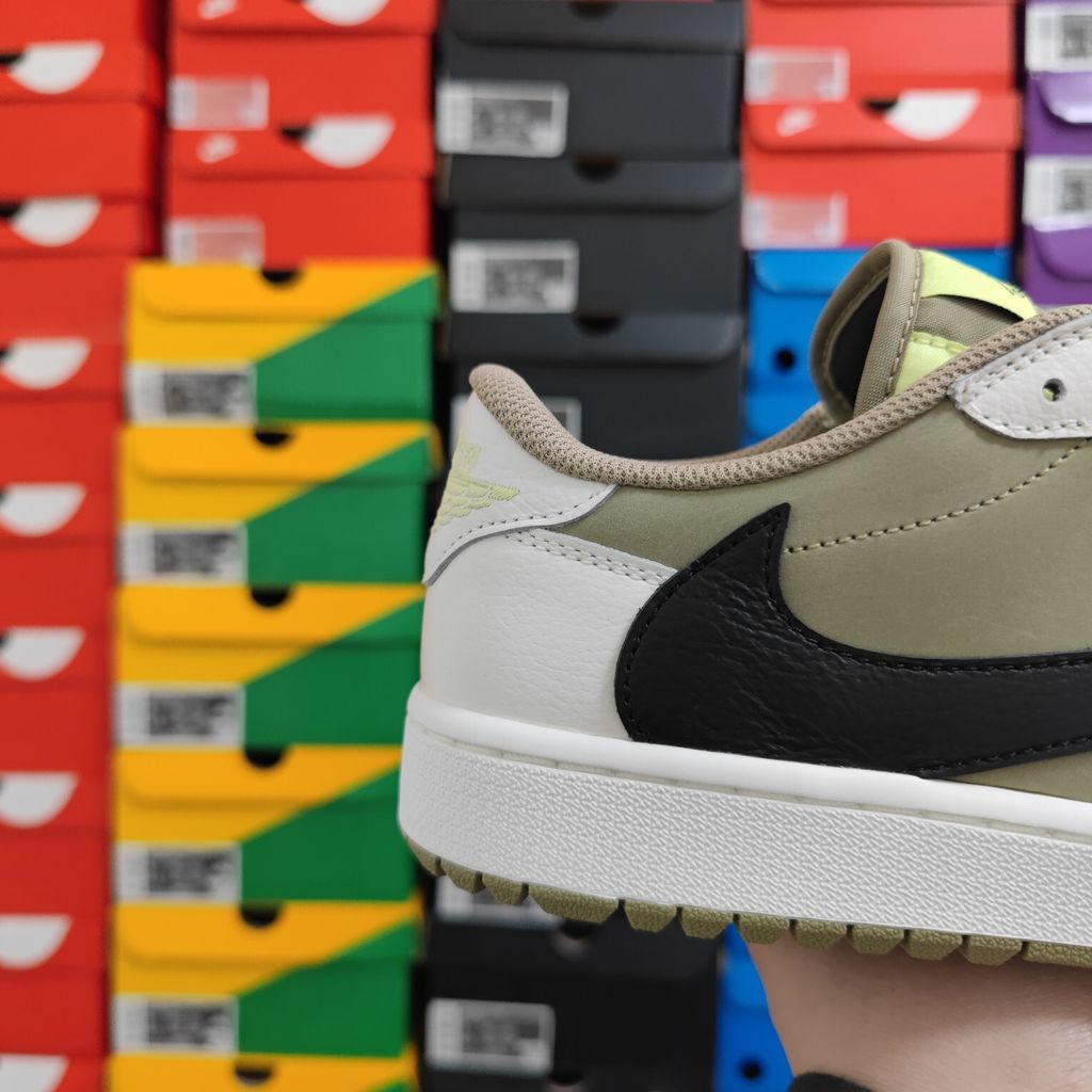 Shop Travis Scott x Air Jordan 1 Low Golf FZ3124-200 Neutral Olive with reverse Swoosh, Cactus Jack branding, Nike Air cushioning and golf traction.